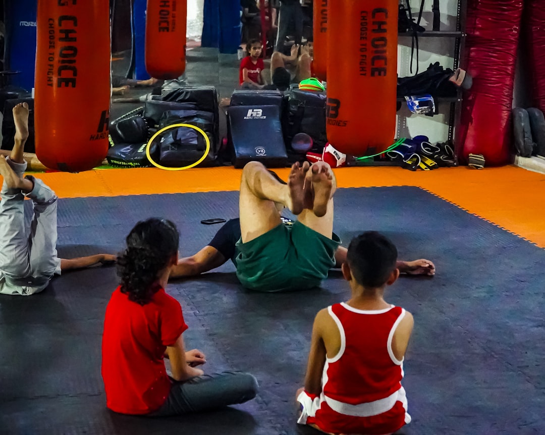 BJJ class with students in proper training gear for beginners