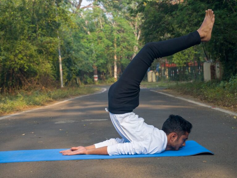 Man doing yoga pose for BJJ recovery and stretching