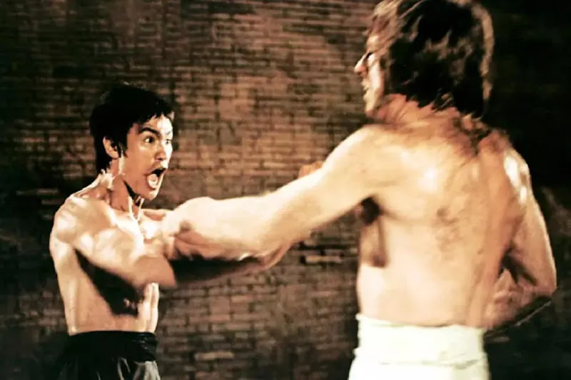 Chuck Norris famous roundhouse kick in martial arts film