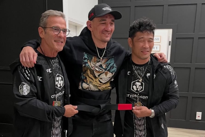 Max Holloway receives BJJ black belt from Pedro Sauer after UFC 326