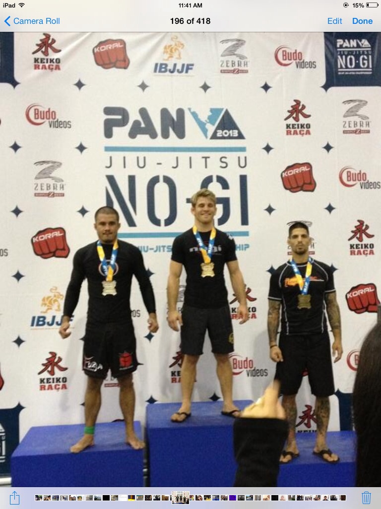 No-gi grappling competitor at IBJJF Pan American Championships demonstrating elite submission wrestling skills