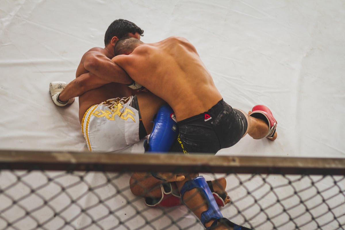 No-gi ground grappling showing dominant top position in submission wrestling