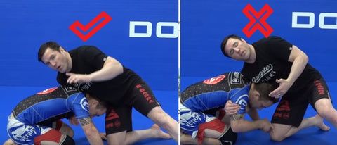 BJJ instructor demonstrating correct hand placement for anaconda choke setup