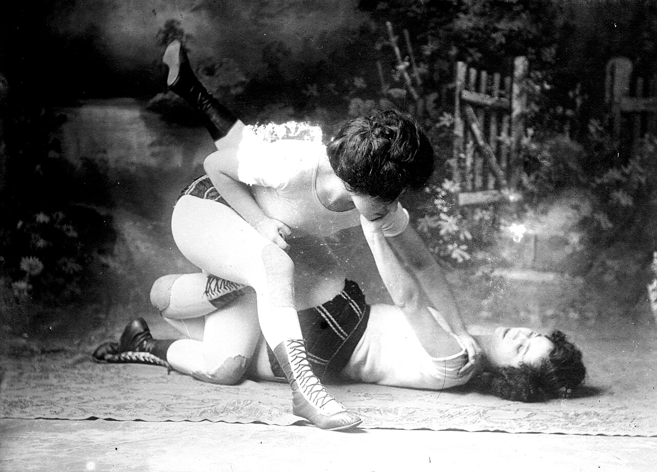 women grappling