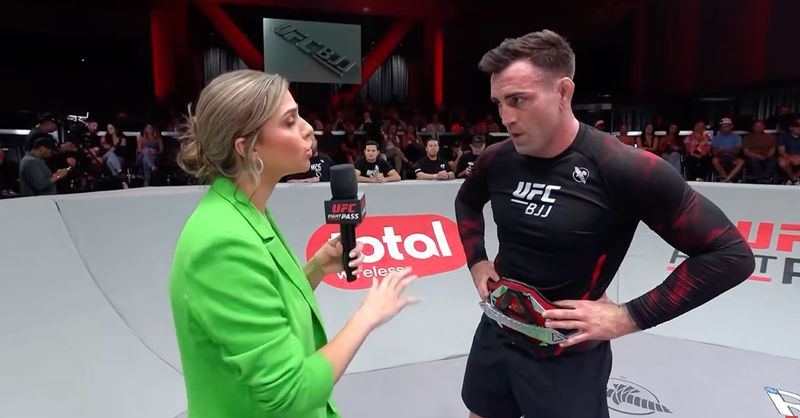 Mason Fowler interviewed with the UFC BJJ light heavyweight title belt before his UFC BJJ 9 defense