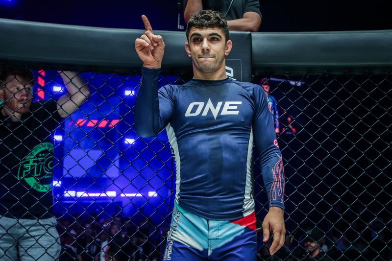 Mikey Musumeci victory pose after no-gi submission win