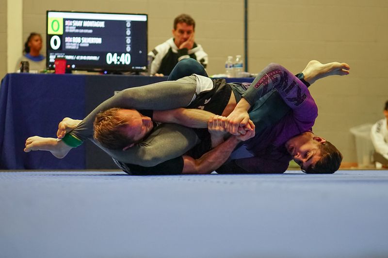 No-gi competition top control leading to an anaconda choke