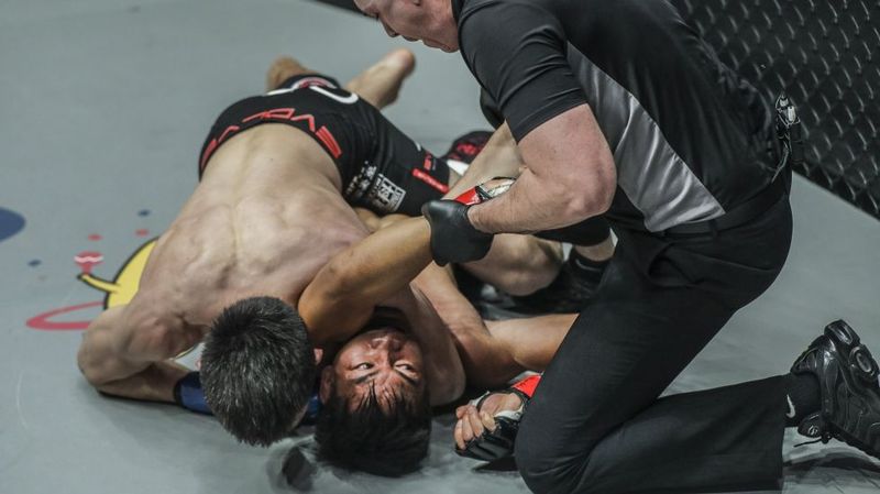 Kata gatame no-gi finish with referee close — head and arm choke at ONE Championship