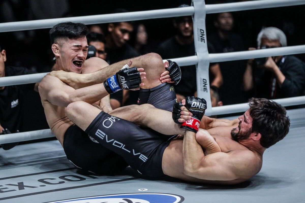 Garry Tonon attacking an armbar no gi in a ONE Championship grappling match