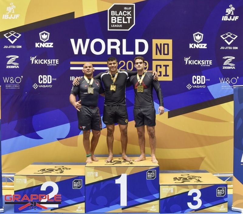 IBJJF No-Gi World Championship podium showing faded rashguards from competition wear