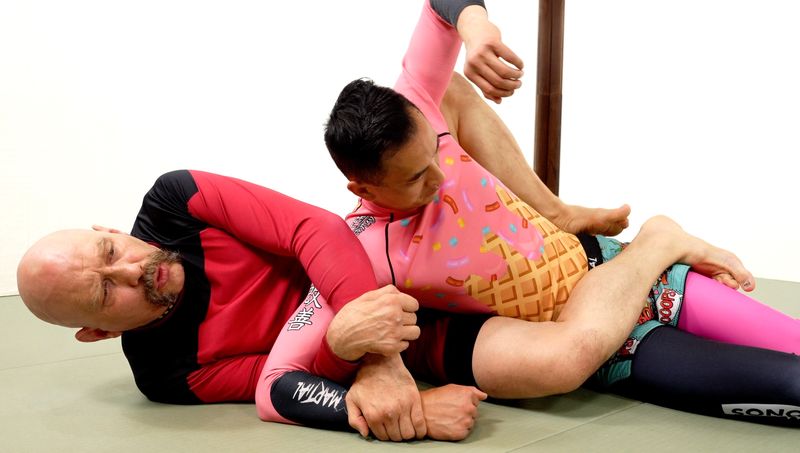 Kimura BJJ attack from back control in no-gi