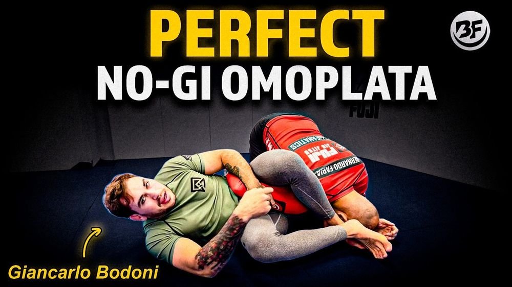 No-gi omoplata shoulder lock applied on the ground