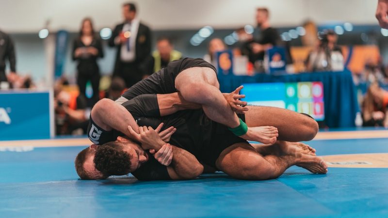 Seatbelt grip and back control before the rear naked choke in no-gi