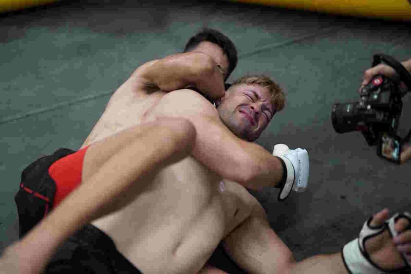 Rear naked choke finish during no-gi grappling training