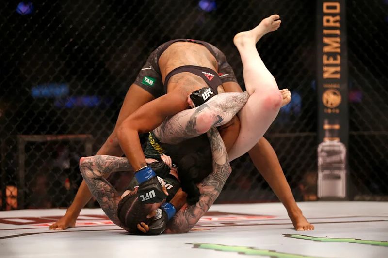 Overhead view of a triangle choke no gi figure four lock