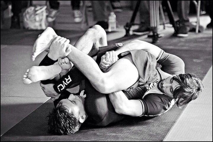 No-gi grapplers in the truck position, the launch point for the twister submission
