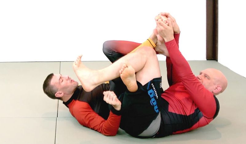 Defending a calf slicer from de la riva no-gi