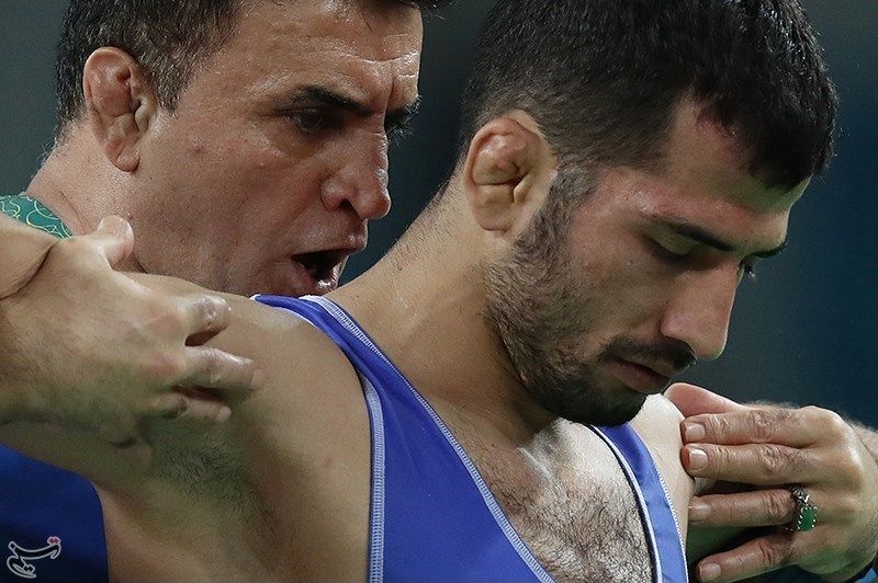 No-gi grapplers clinching showing exposed ears at risk of cauliflower ear