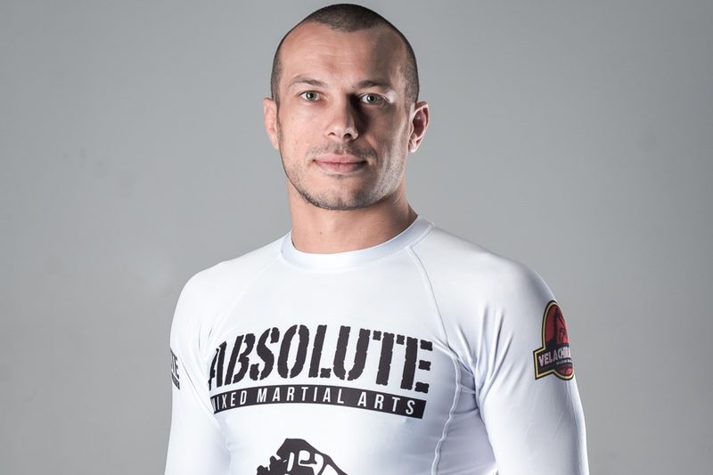 Lachlan Giles no-gi butterfly guard grappling in a rashguard