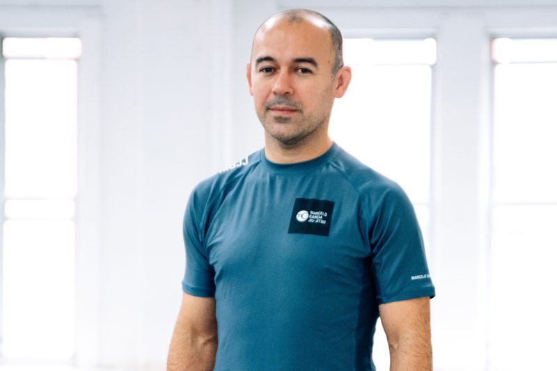 Marcelo Garcia the king of the butterfly guard in a no-gi rashguard