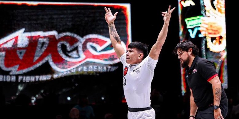 No-gi grappler celebrating a win after clean guard passing