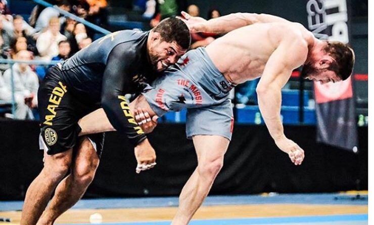 No gi grappling takedown at an ADCC style competition