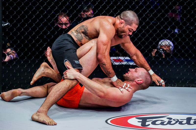 No-gi pressure passing with top control in a submission grappling match