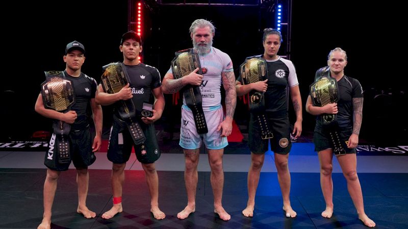 No-gi grappling champions wearing rashguards