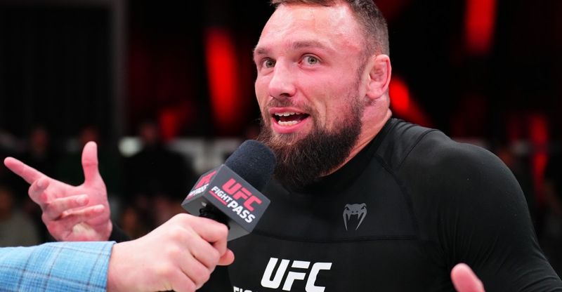 No-gi submission grappling competitor after a leg lock win