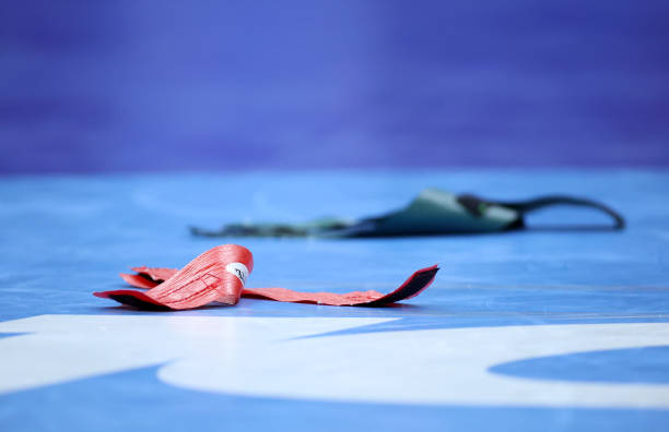 Anklets are seen on the mat during the 2025 NCAA Division I Wrestling Championships at the Wells Fargo Center on March 22, 20