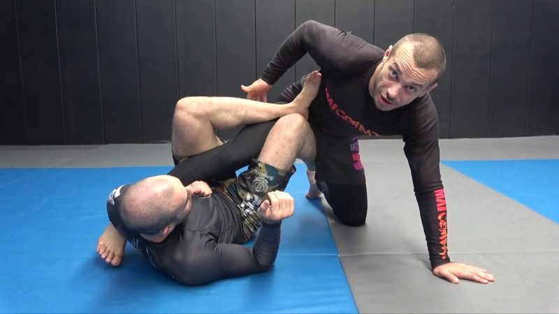 Single leg X ashi garami position controlling an opponent's leg in no-gi