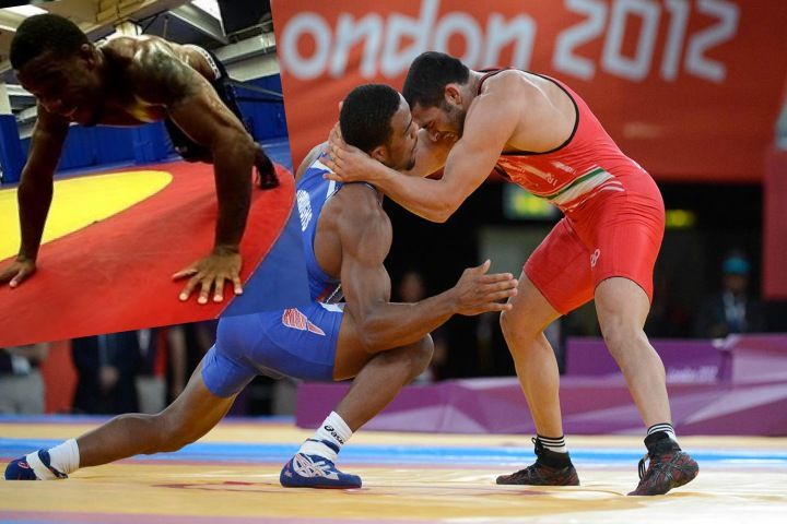 Freestyle wrestlers changing levels before a double leg takedown