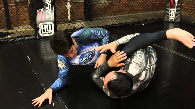 Z-guard knee shield in no-gi half guard framing against the opponent