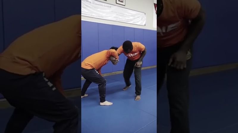 Arm scoop entry for fireman's carry in no-gi front headlock position