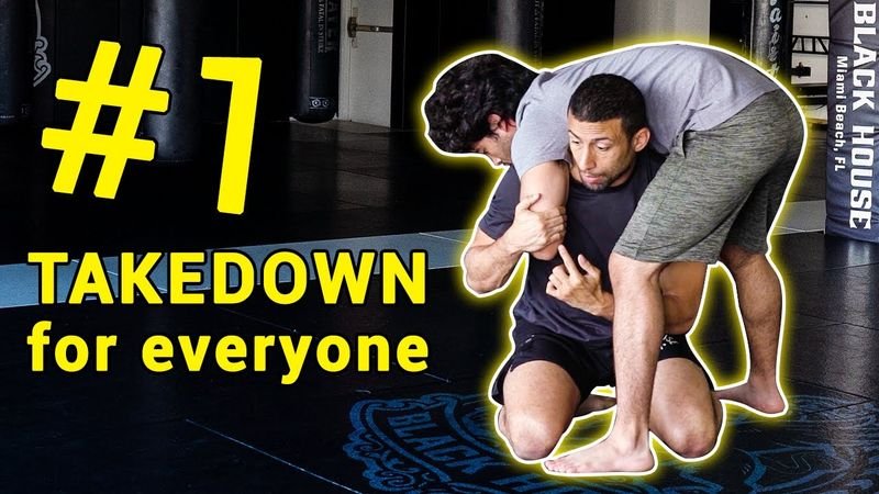 Fireman's carry mid-position — opponent loaded across shoulder in no-gi grappling