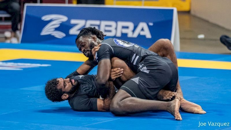 No-gi BJJ competitor in dominant top control position at IBJJF No-Gi Pans