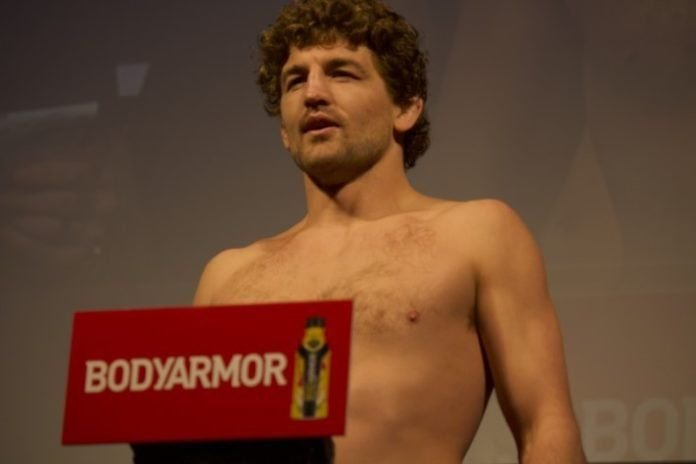 Ben Askren applying pressure with the bulldog choke inside the UFC octagon