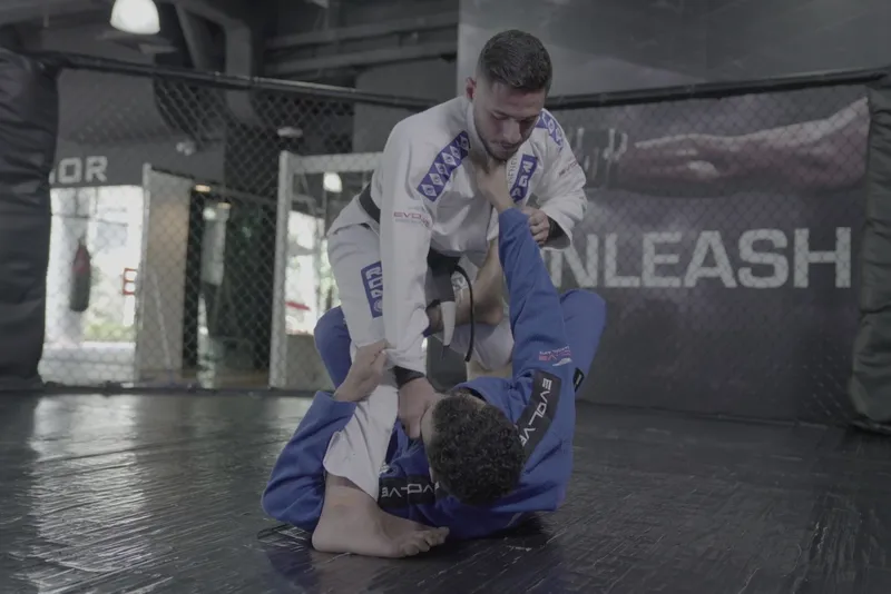 A no-gi submission grappling scramble heading toward back control
