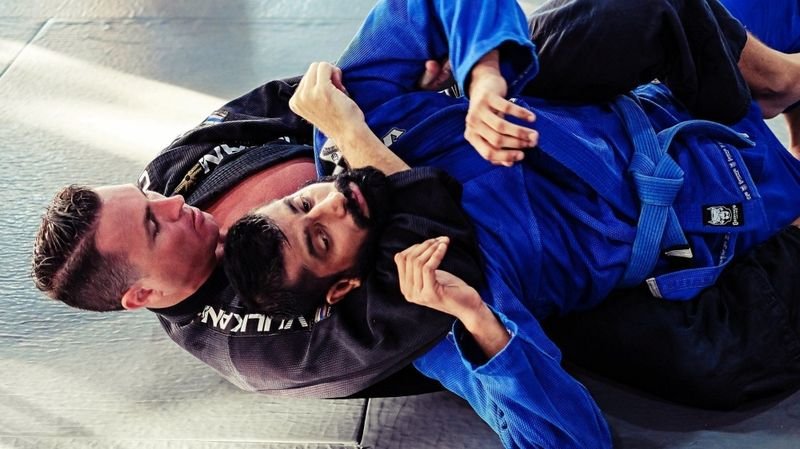 BJJ rear naked choke back control hooks no-gi grappling position