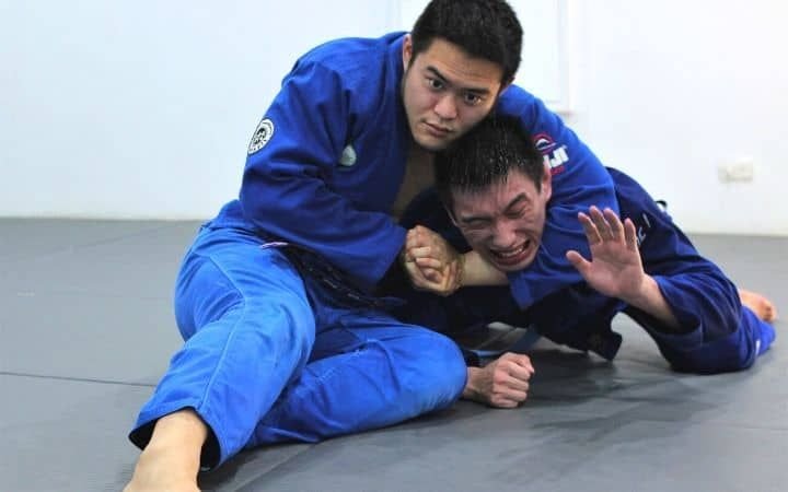 Crucifix control set up before finishing the no-gi bulldog choke