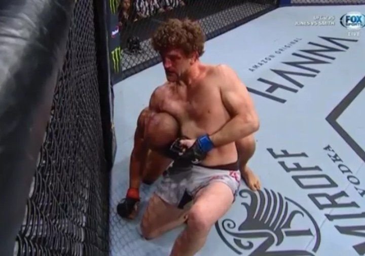 Ben Askren sinking in the bulldog choke against the cage at UFC 235
