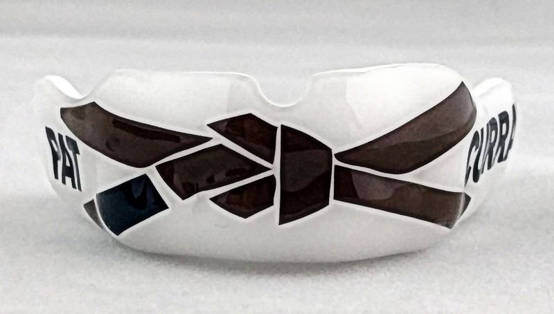 Custom-molded BJJ mouthguard shaped to an athlete's bite
