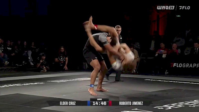 Roberto Jimenez and Elder Cruz mid-scramble during a no-gi submission attempt