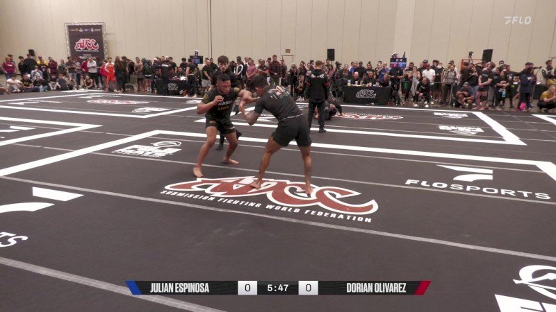 Julian Espinosa and Dorian Olivarez exchanging grips at the ADCC Trials