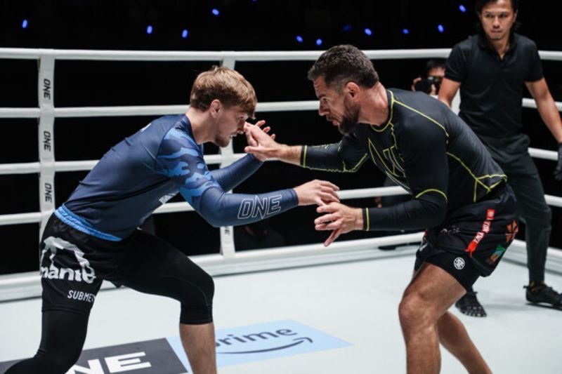 Pawel Jaworski clinching with Rafael Lovato Jr at ONE Fight Night 47, the win that preceded his ADCC 2026 gold