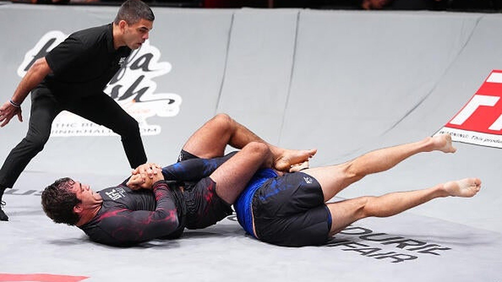 Jay Rodriguez locks in the inverted D'Arce choke against Kevin Beuhring at UFC BJJ 11
