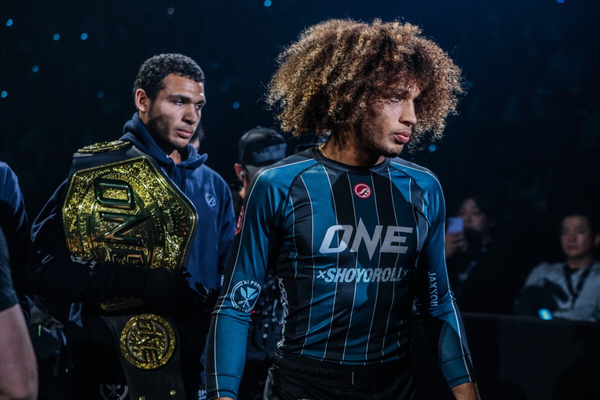 Kade Ruotolo walks out wearing a no-gi rashguard ahead of a submission grappling title defense