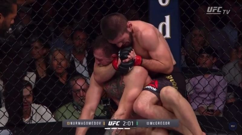 Khabib applies rear naked choke variation on McGregor showing over-chin pressure