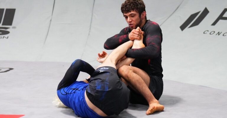 Mikey Musumeci grappling at a UFC BJJ title defense