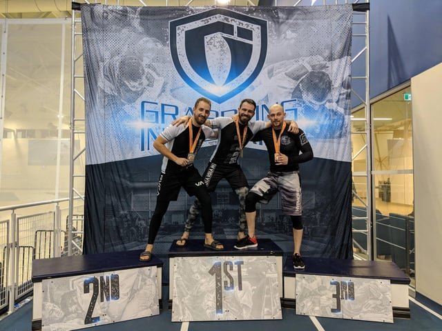 r/bjj - Took a gold at Grappling Industries Toronto and made the podium with all my teammates. Feels great!